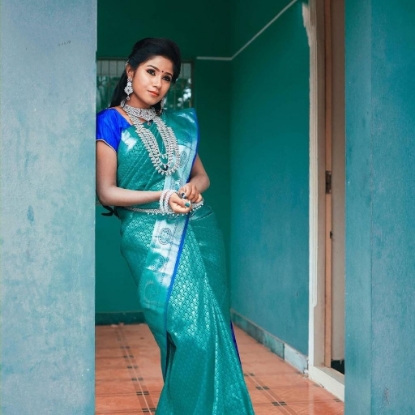 Picture of The All-Over Golden Jari Lichi Silk Saree in Green