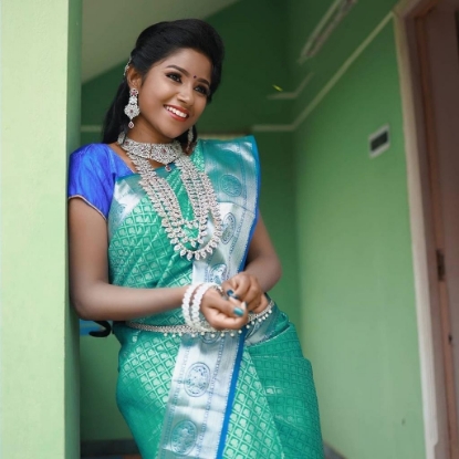 Picture of The All-Over Golden Jari Lichi Silk Saree in Green