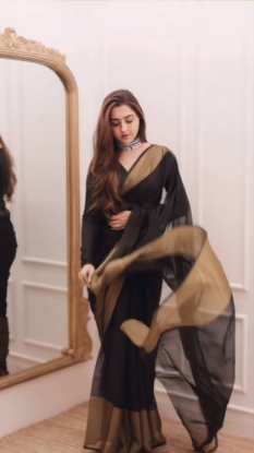 Picture of Unveiling Elegance: The Golden Black Chiffon Saree