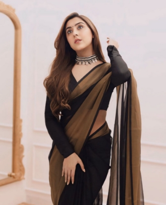 Picture of Unveiling Elegance: The Golden Black Chiffon Saree