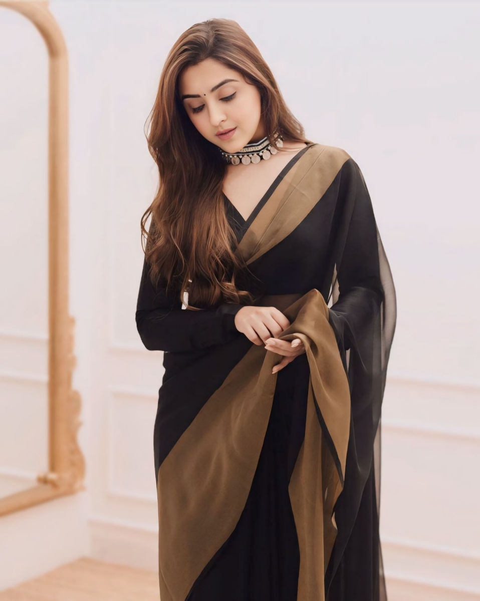 Picture of Unveiling Elegance: The Golden Black Chiffon Saree