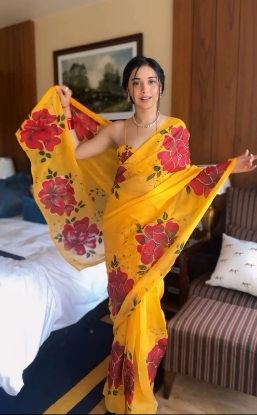 Picture of Soft Georgette Silk Saree With Beautiful Yellow Floral Design